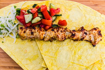 chicken kebab on pita bread