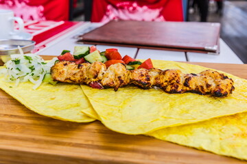 chicken kebab on pita bread