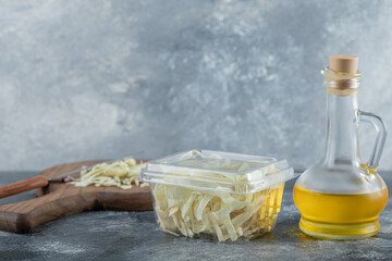 Obraz premium Dairy products assortment on wooden table chees and oil