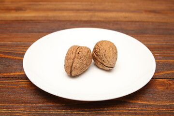 walnut open and closed close-up on white background texture worm