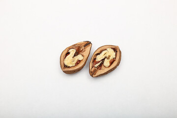 walnut open and closed close-up on white background texture worm
