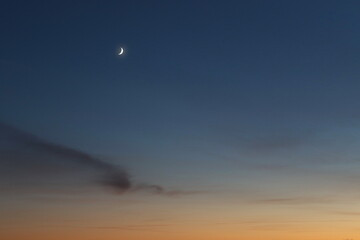 Sky with moon in afterglow