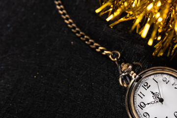 Fototapeta na wymiar Golden stopwatch time to New Year.