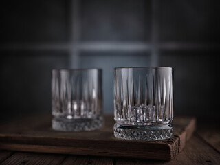 Empty whiskey glasses on table
