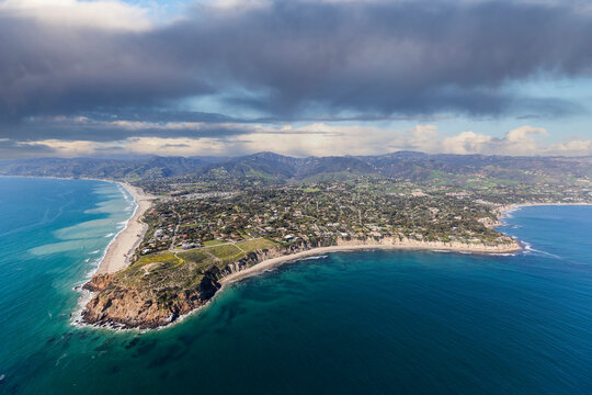 Aerial view of Point Dume and Westward Beach with stormy sky in scenic Malibu California.  