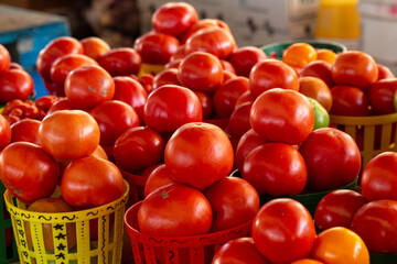 Baskets of Many Red Tomatoes at Farmers Market
