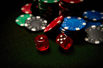 Dice and chips are on the table. Casino.