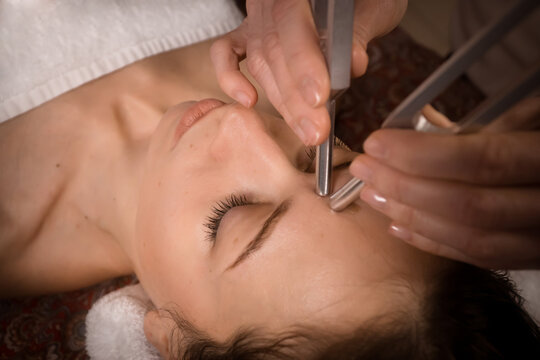 sound therapy healing and facial anti-age massage with tuning fork 