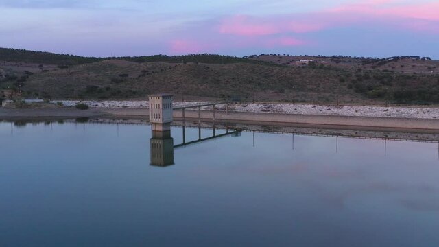 Drone aerial view of a dam lake reservoir landscape in Terena, Portugal