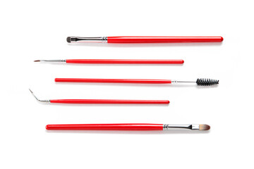 red makeup brushes on white, 5 makeup brushes