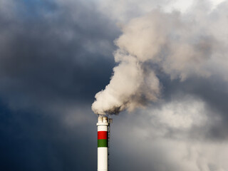 Smoke comes out of the white chimney. Ecology.