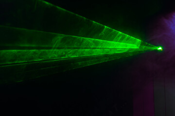 Green lasers for show in smoke