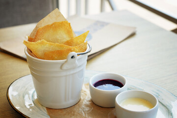 Crispy brush fried dough with sweet sauce