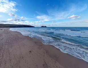 aerial drone shot of Holywell bay cornwall uk 