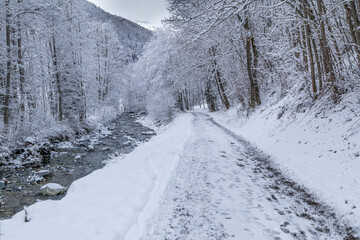 A very snowy riverside walk in the pretty French Alpine village of Les Contamines-Montjoie