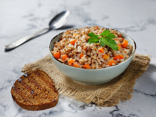 Buckwheat porridge with carrots and toast