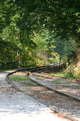 Old Style Train Tracks Merge As They Curve Around a Bend