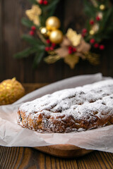 Christmas Stollen on a wooden table.