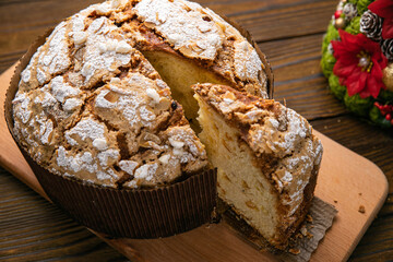 Panettone holiday cake on a wooden background
