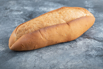Loaf of bread on grey background
