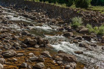 The Aragon river as it passes through the city of Canfranc, Huesca, Spain