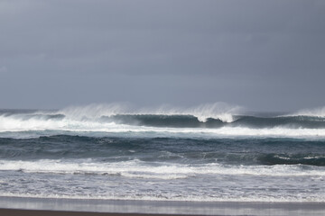 Waves, winter time at the Azores, beach in Ribeira Grande.	