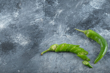 Organic Green hot chili peppers with slices