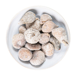 Dried figs in a white ceramic bowl