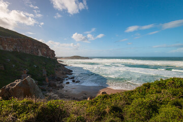 Scenic view of coastline and sea at Robberg Nature Reserve, Plettenberg Bay, South Africa.