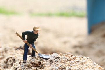 Miniature worker doll holding shovel for working, miner man at work tiny figure toy model digging...