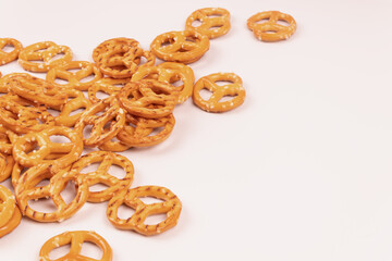 A small amount of salted crackers sprinkled on the left side