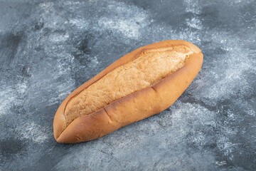Loaf of bread on grey background
