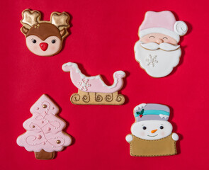 Flat lay composition with tasty homemade Christmas cookies on red background