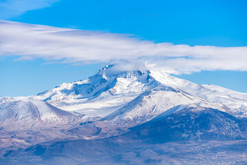 Erciyes mount in Kayseri. Snowy scarlet mountain. Erciyes is a large stratovolcano, reaching a height of 3,864 m it the highest mountain and most voluminous volcano of Central Anatolia