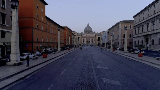Aerial drone view, San Pietro Basilica, shot with drone along Via della Conciliazione  - Vatican City