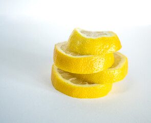 Fototapeta na wymiar lemon slice stack on white