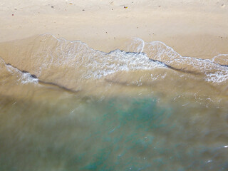 Sea and sandy beach with white waves. Top view Krabi, Thailand is a famous beach.