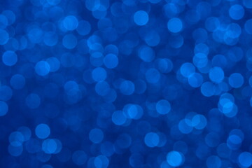 Blue light bokeh glitter background. Image photo