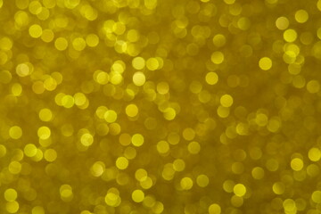 Golden light bokeh glitter background. Image photo