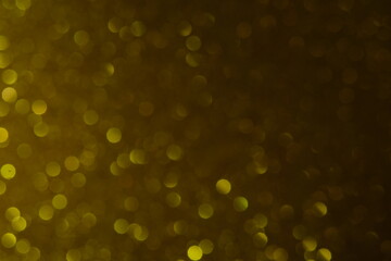 Golden light bokeh glitter background. Image photo