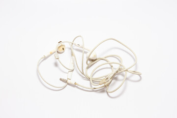 Headphones that have been used before are dirty. on white blackground