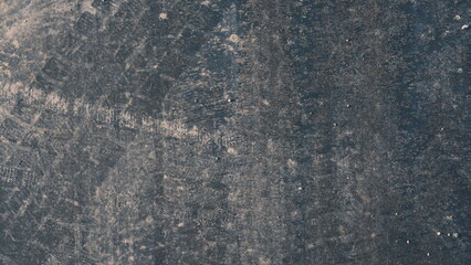 tire tracks over grungy surface