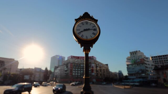 timelapse clock in Piata Romana, Bucharest