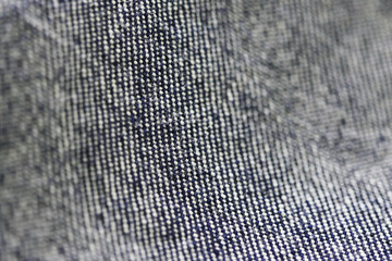 Jeans denim texture close up , focus only one point , soft blured background wallpaper