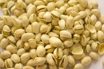 close up Pile of Pistachios isolated on white background.