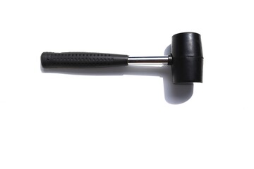 Black rubber hammer with rubber handle isolated on white background closeup.