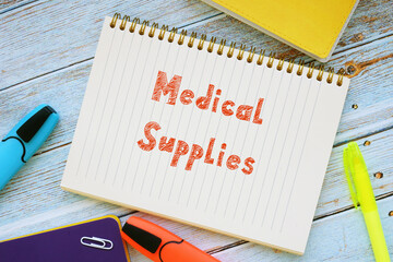 Business concept about Medical Supplies with phrase on the sheet.