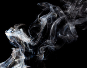 Smoke isolated on black background.