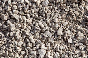 Stone gravel at a construction site as a background.