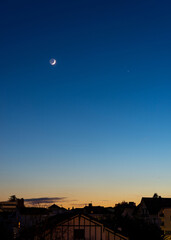 Crescent Moon, Jupiter and Saturn conjunction. 17 December 2020, in Bayonne, France.